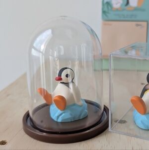 Cute Pinga Figurines in Display Case